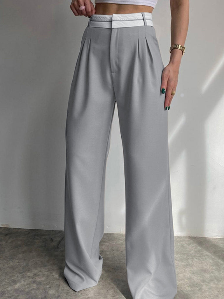 High waist wide leg pants made with smoke gray fabric asymmetrical